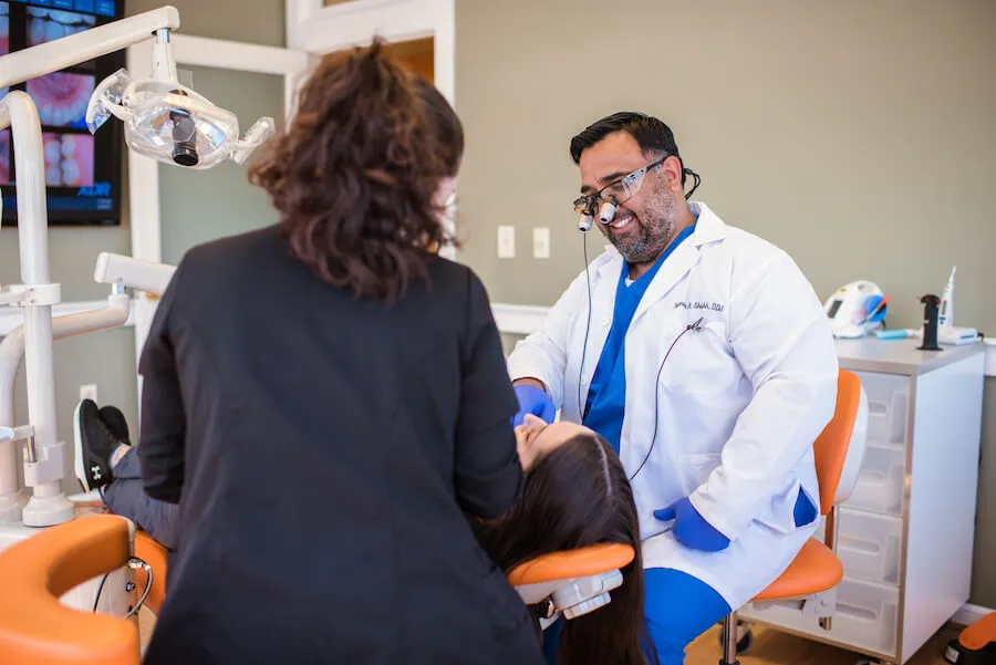 Dr. Shaikh reviewing x-rays with a colleague